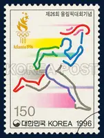 The Olympic torch carrier and the Emblem