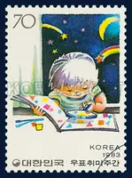 A Child collecting Stamps