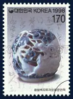 Blue and white procelain featuring a cloud and dragon decoration