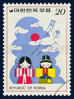 children performing new year`s bow