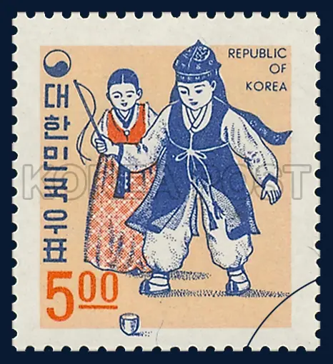 Children spinning a top Single stamp