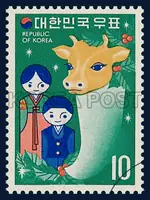 Doll and cow in X-mas tree