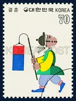 Man carrying a silk-cover- ed lantern