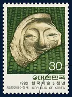 Human-faced Roof Tile with Apron