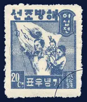 A couple holding a child and the Korean flag