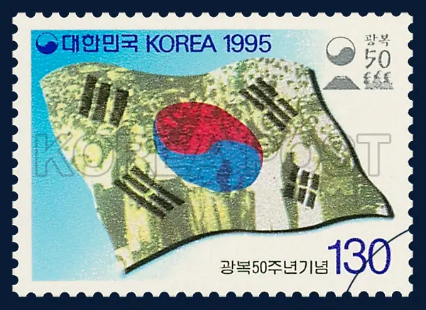 the national flag with the Korean people celebrating Korea`s Liberation Single stamp