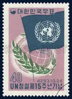 Earth wrapped in UN flags and laurel wreaths