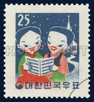 Two Children singing hymns at Christmas