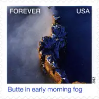 Earthscapes - Butte in early morning fog