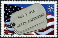 dog tags reading POW & MIA - Never Forgotten