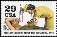 Military medics treat wounded