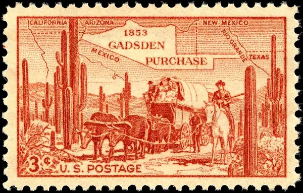 covered wagon in desert & map of Gadsden Purchase